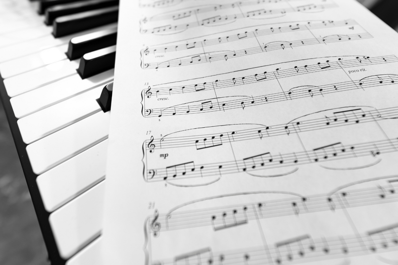 Music sheets on piano